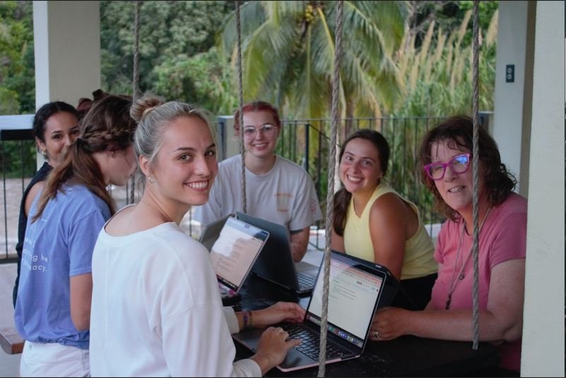 Students working on the deck